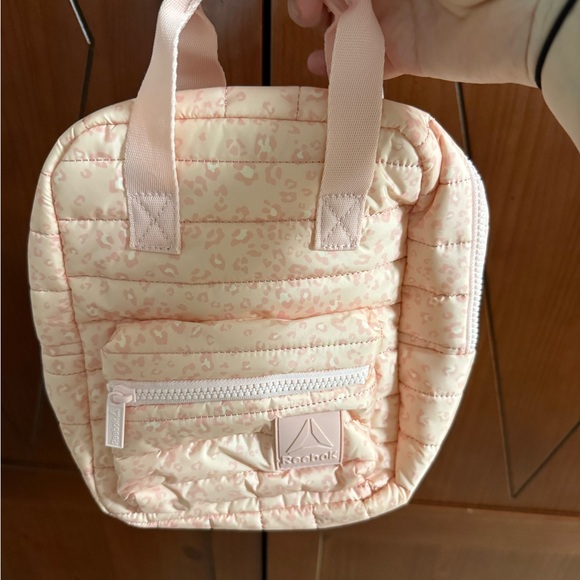 Reebok Handbags - Reebok Light Pink Quilted Mini Handbag with Subtle Leopard Print